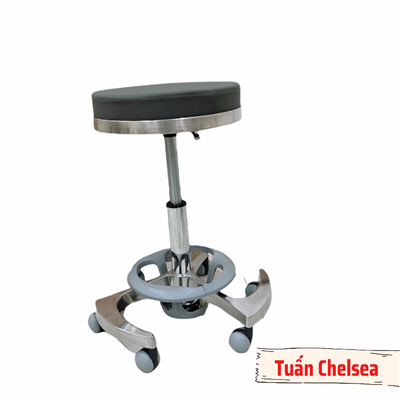 Ghế đôn xoay cho thợ cắt tóc.
